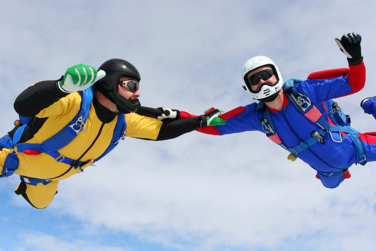 Two skydivers learn to skydive
